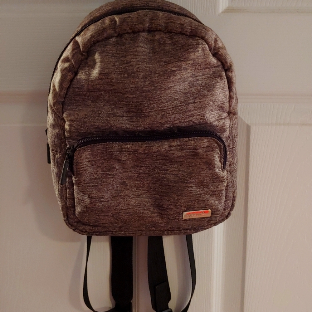 PINK VICTORIA'S SECRET mini backpack.